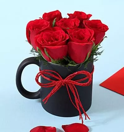 RED ROSES WITH BLACK MUG – same-day flower delivery Pakistan | Proflowers.pk